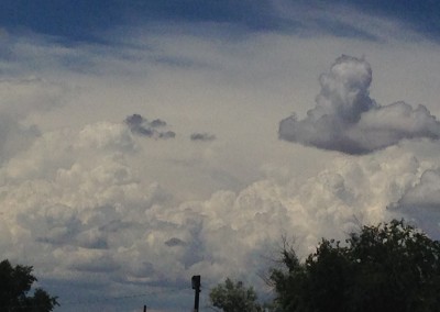 Cloud formations floating over Santa Fe, NM. Photograph by Johnna M. Gale